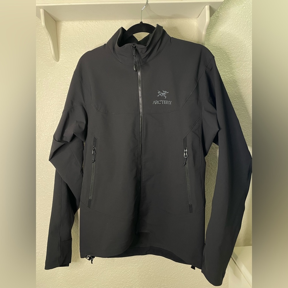 Black Arcteryx weather proof jacket